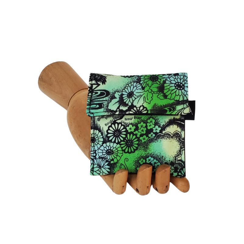 Elaborate Japanese style garden print on a green background. Velcro Mini Wallet by Anne Marie Beard. Handmade in Austin, Texas since 2004 y'all! annemarie mini wallet austin texas garden japanese floral limited edition