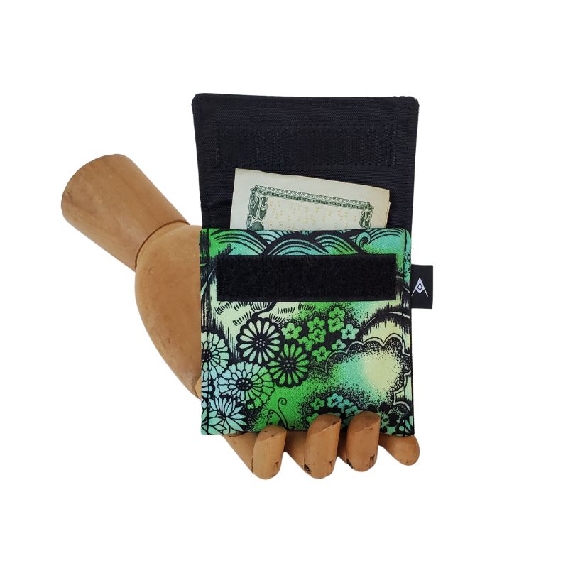 Elaborate Japanese style garden print on a green background. Velcro Mini Wallet by Anne Marie Beard. Handmade in Austin, Texas since 2004 y'all! annemarie mini wallet austin texas garden japanese floral limited edition