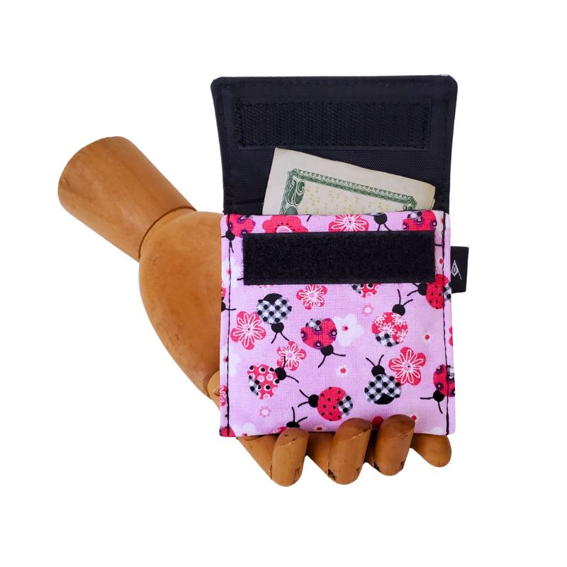 Ladybug print on a pink background. Velcro Mini Wallet by Anne Marie Beard. Handmade in Austin, Texas since 2004 y'all! annemarie mini wallet austin texas ladybug creatures cute picnic spring